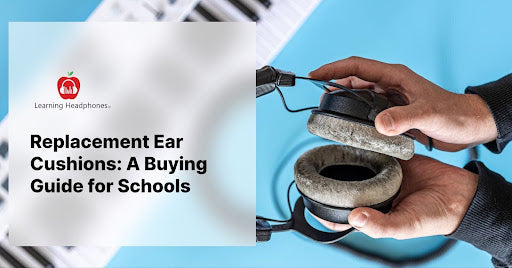 Hands holding replacement ear cushions for headphones with a piano background, illustrating a buying guide for schools.