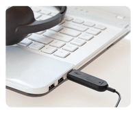 Thumbnail for Logitech H340 USB headset connected to a laptop, ideal for school headphones and online learning.
