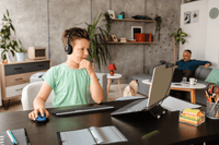 Thumbnail for Child using Logitech H111 headset for online learning at home, ideal bulk school headphones for education.