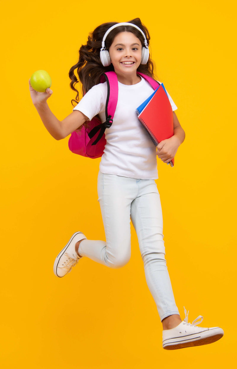 Student with backpack wearing school headphones