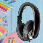 Smart-Trek Deluxe Headphones on a desktop with colorful school supplies, ideal bulk headphones for education.