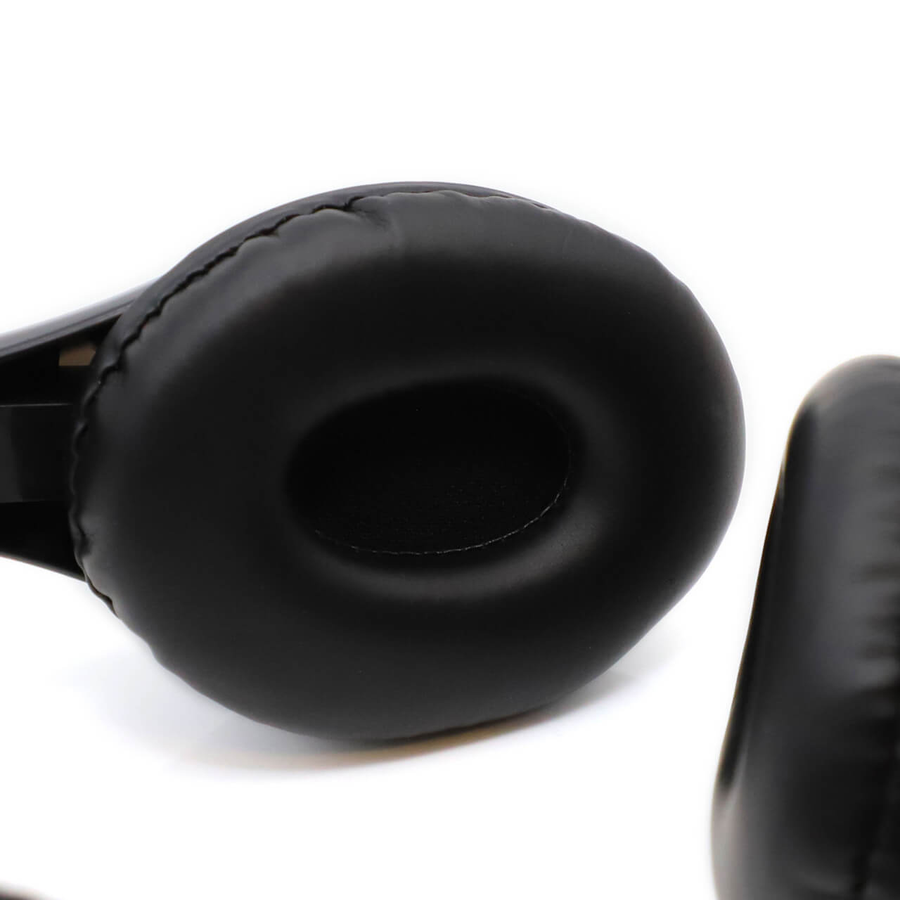 Close-up of AE-36 USB-C headset ear pads, showcasing comfort and quality for school headphones.