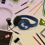 AE-54 Classroom Headphones - Blue on a desk surrounded by school supplies.