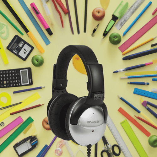 Koss QZPro Active Noise Cancellation Headphones surrounded by school supplies, ideal for bulk school headphone packs.