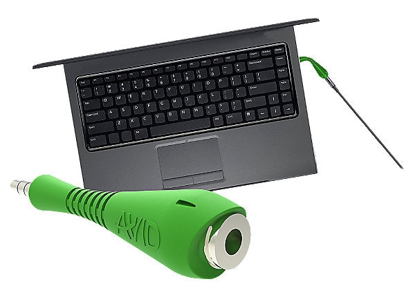 A green Fishbone TRRS adapter next to a laptop keyboard, ideal for bulk school headphones and education technology.