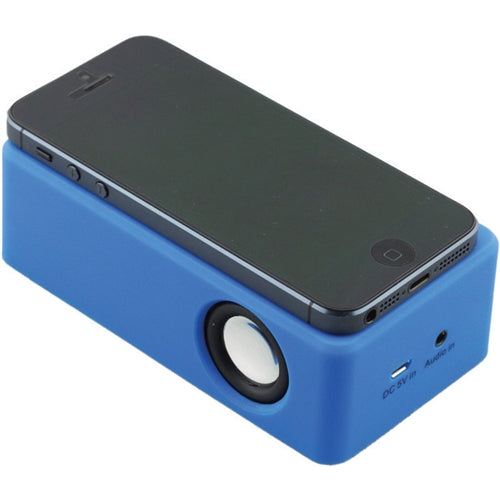 Universal induction wireless speaker for mobile phones with smartphone on top, ideal for classrooms and education.