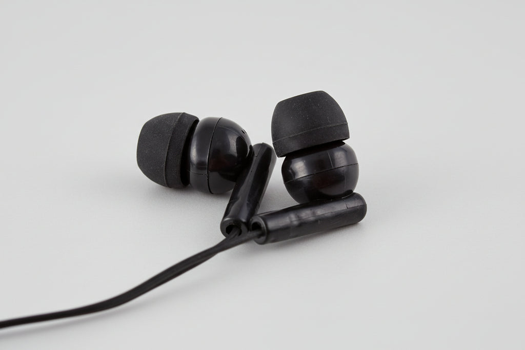 Black silicone earbuds from a bulk school headphones pack, ideal for classroom use and educational settings.