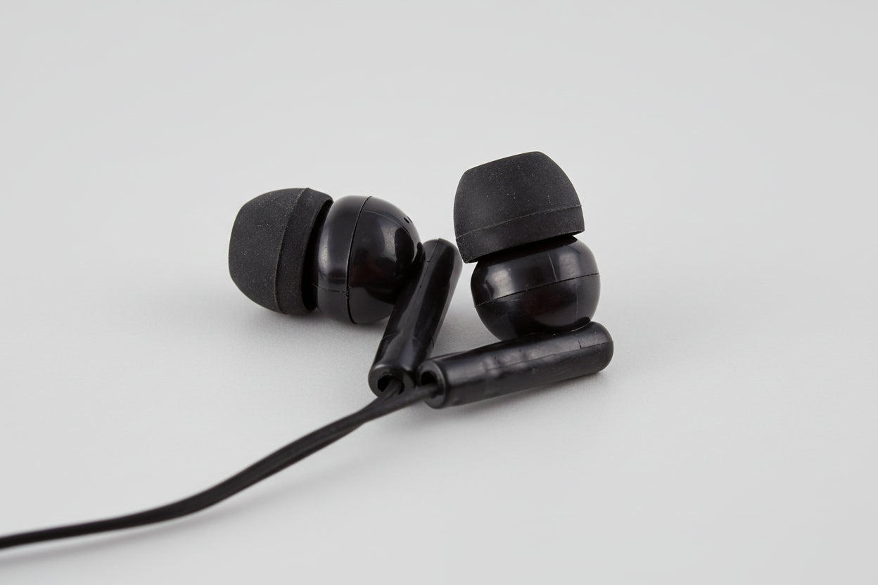 Black silicone earbuds from a bulk school headphones pack, ideal for classroom use and educational settings.