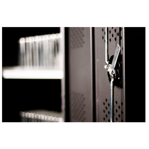 Close-up of a secure locking mechanism on a tablet charging cart, ideal for safe storage of school headphones and electronics.